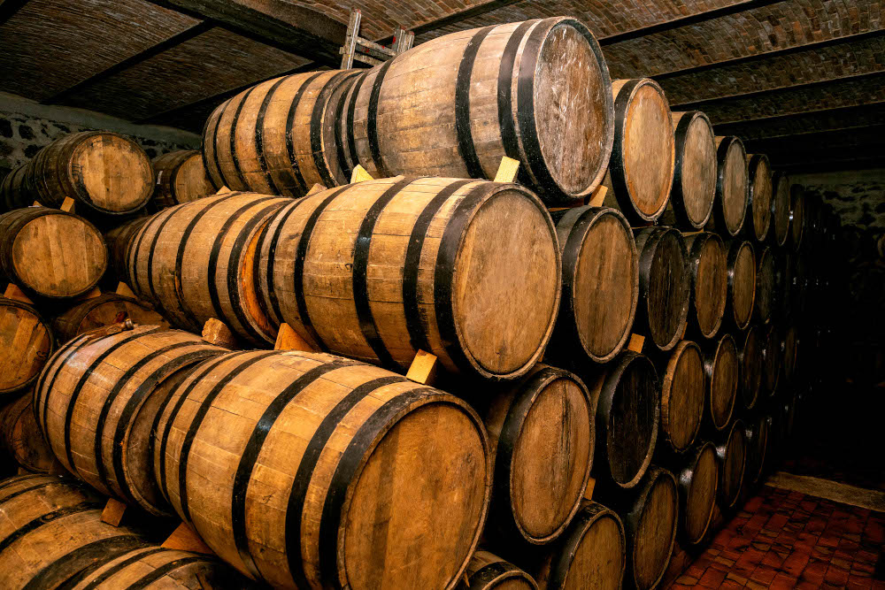 Wine auctions can be a good way to discover organic wines. u00e2u20acu201d Jesus Cervantes/Shutterstock pic via ETX Studio