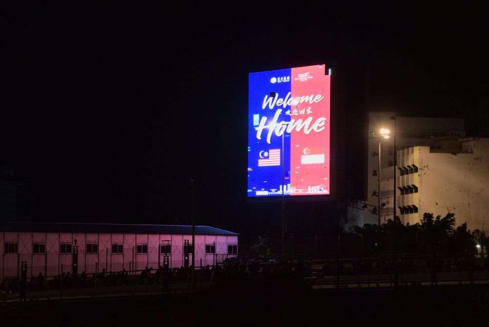 An LED sign celebrates the reopening of Malaysia and Singapore borders in Tambak Johor April 1, 2022. u00e2u20acu201d Bernama pic