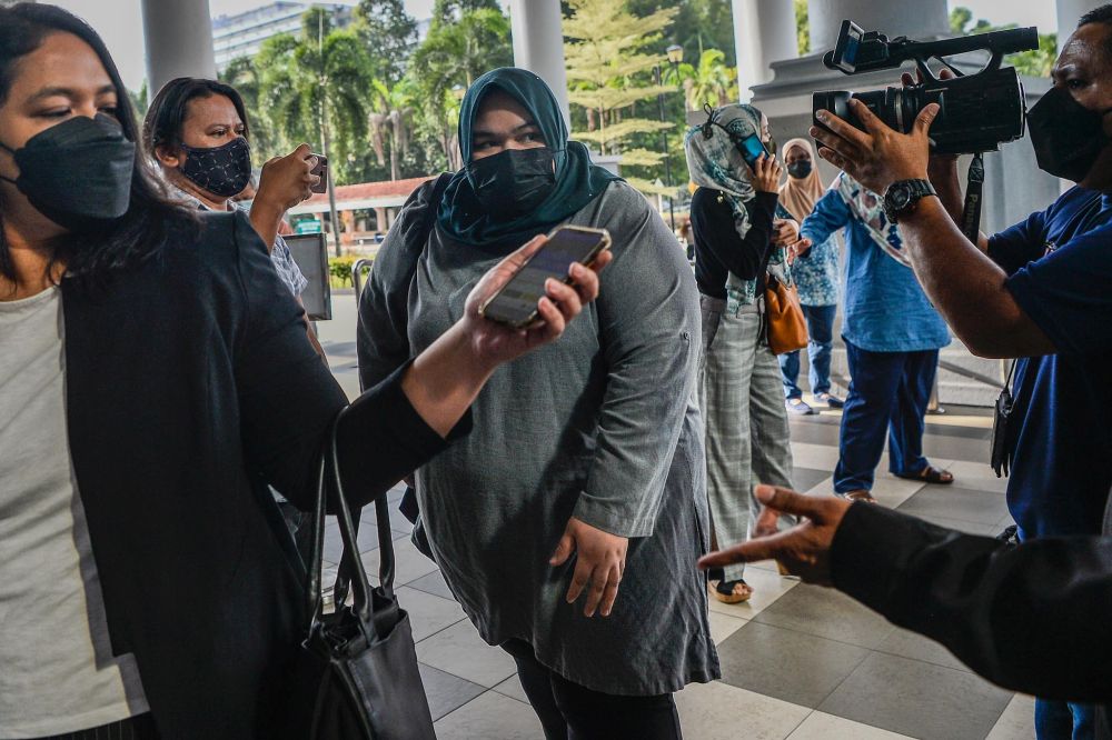 Rumah Bonda founder Siti Bainun Ahd Razali arrives at the Kuala Lumpur High Court April 20, 2022. u00e2u20acu201d Picture by Hari Anggara