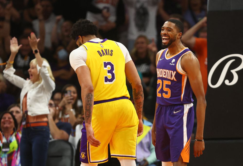 Phoenix Suns forward Mikal Bridges celebrates alongside Los Angeles Lakers forward Anthony Davis (3) in the second half at Footprint Centre, Arizona April 5, 2022. u00e2u20acu201d Reuters pic