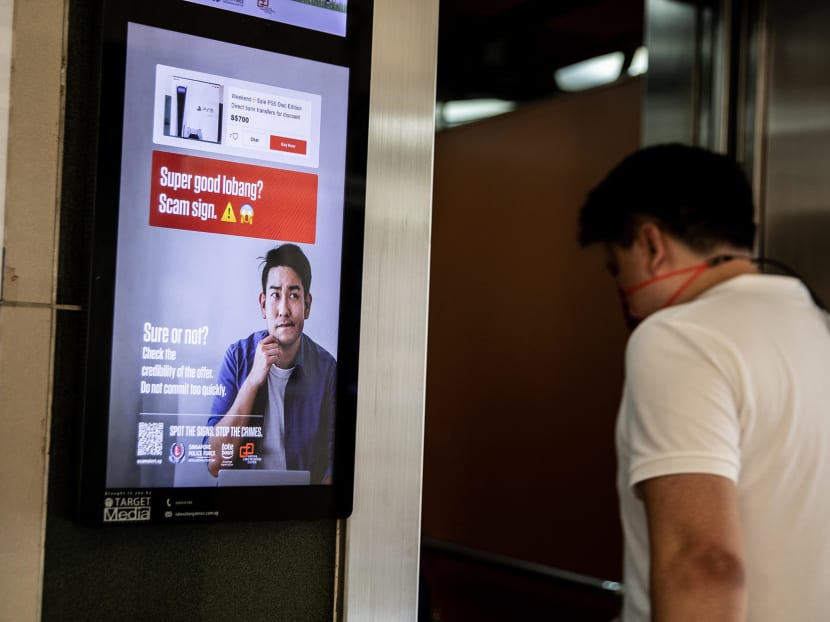An anti-scam poster seen at a lift lobby in a public housing block in Tiong Bahru on February 4, 2022. u00e2u20acu2022 TODAY pic