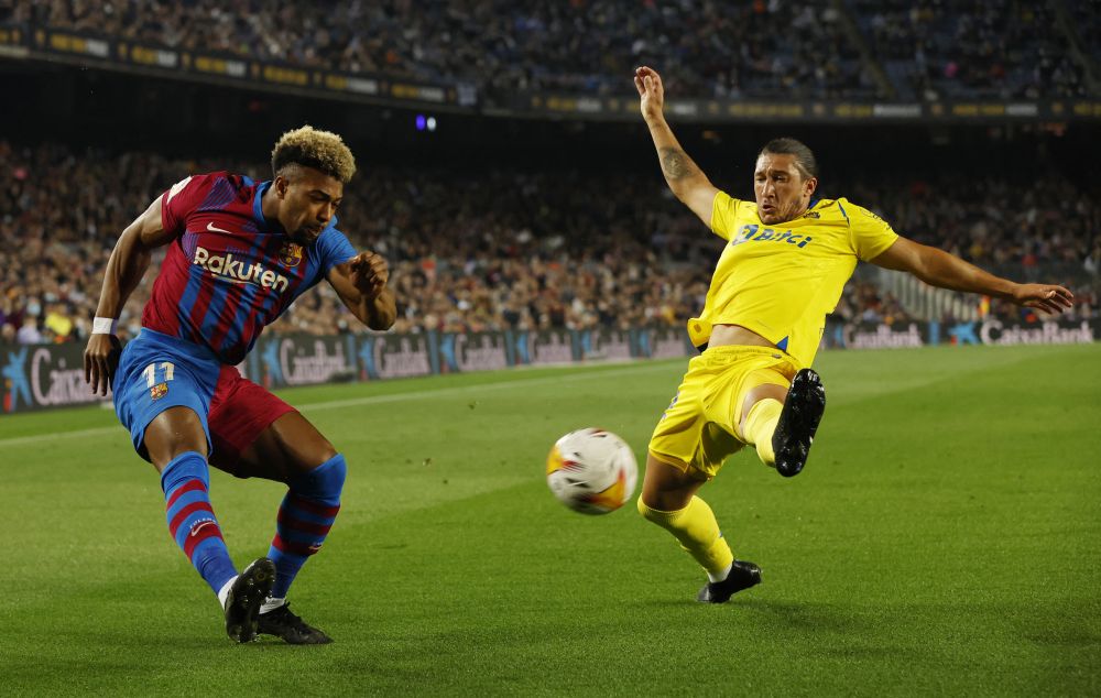 Barcelona's Adama Traore in action with Cadiz's Luis Alfonso Espino at Camp Nou, Barcelona April 18, 2022. u00e2u20acu201d Reuters pic