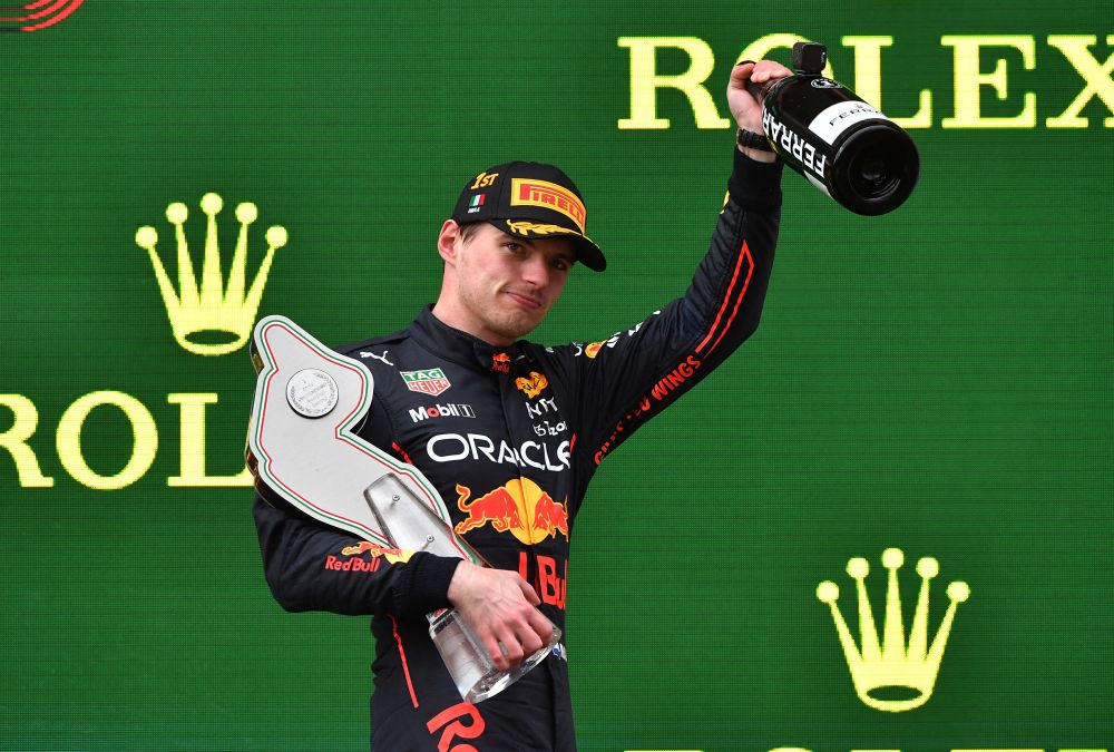 Red Bull's Max Verstappen celebrates on the podium with the trophy after winning the Emilia Romagna Grand Prix in Imola April 24, 2022. u00e2u20acu201d Reuters pic