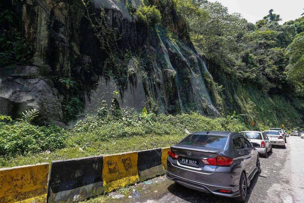 A general view of rockfall netting covering hilly terrain along Lorong Bukit Kukus in Paya Terubong April 25, 2022. u00e2u20acu201d Picture by Sayuti Zainudinnn