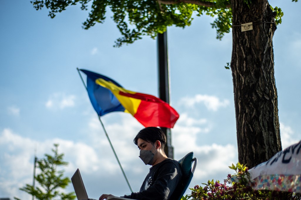 Anti-US military base activist and native Okinawan Jinshiro Motoyama sits during the third day of his hunger strike outside the Ministry of Land, Infrastructure, Transport and Tourism in Tokyo on May 11, 2022. u00e2u20acu201d AFP pic