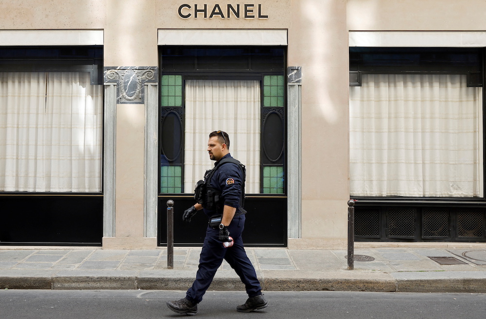 French police officer walks in front of the Chanel store following a robbery, next to the Place Vendome in Paris, France May 5, 2022. u00e2u20acu201d Reuters pic