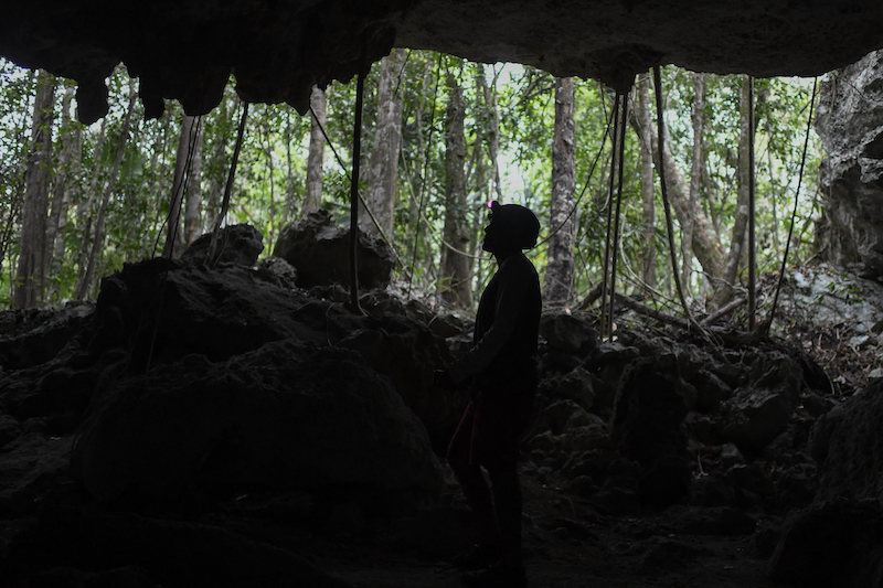 A man explores in the cave system known as Garra de Jaguar (Jaguar's Claw) in the jungle in Playa del Carmen, Quintana Roo State, Mexico April 26, 2022. — AFP pic