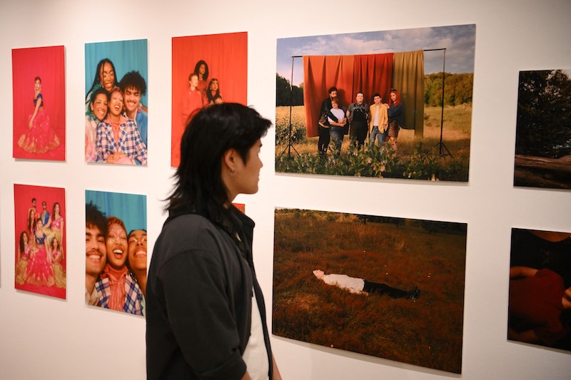 A visitor looks at a set of photos displayed in a gallery of the Queer Britain museum, in London May 6, 2022. u00e2u20acu201d AFP pic