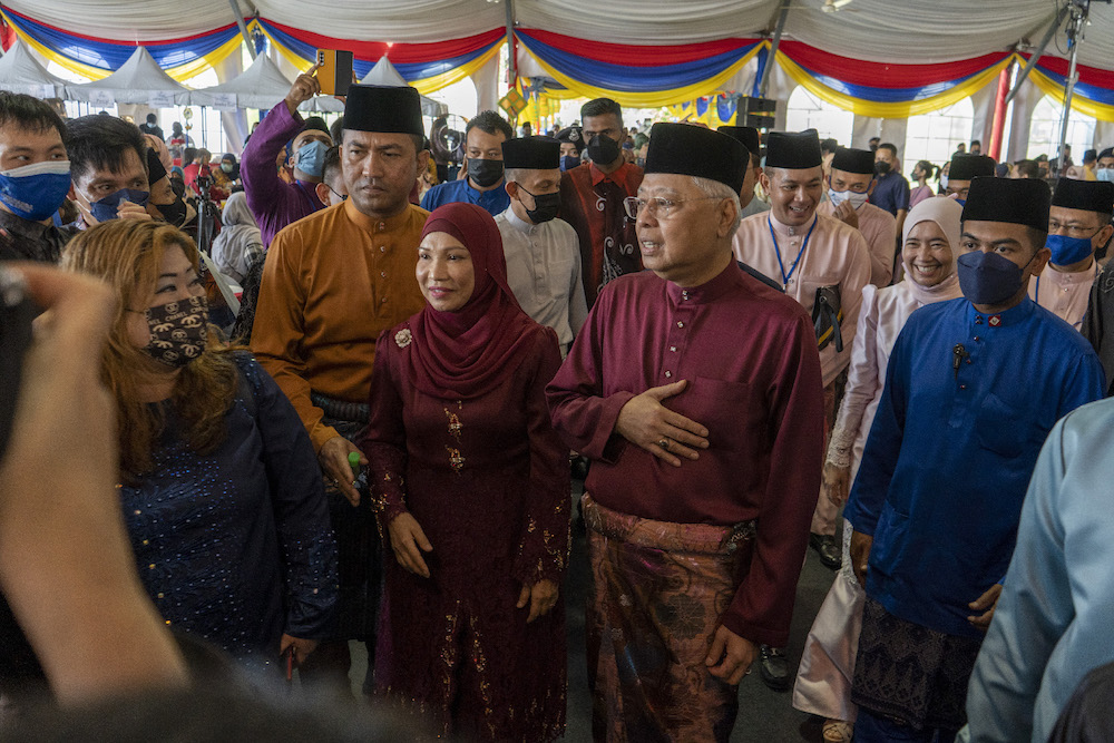 Prime minister, Datuk Seri Ismail Sabri Yaakob and his wife welcome guests at the Raya Aidilfitri Open House at Seri Perdana, Putrajaya May 8, 2022. — Picture by Shafwan Zaidon