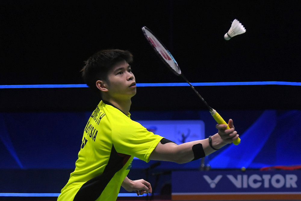 National singles badminton player Leong Jun Hao battling against Cholan Kayan of England at the Thomas Cup Tournament at Impact Arena in Bangkok, May 9, 2022. u00e2u20acu201d Bernama pic