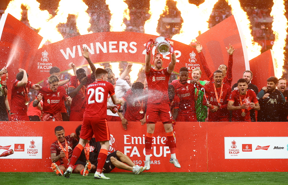 Liverpool's Jordan Henderson lifts the trophy as they celebrate after winning the FA Cup, London May 15, 2022. u00e2u20acu201d Reuters pic 