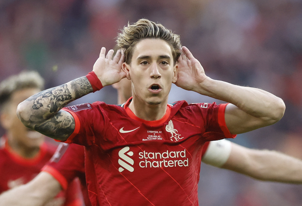 Liverpool's Kostas Tsimikas celebrates after scoring the winning penalty in the shoot-out of the final of the FA Cup, London May 15, 2022. u00e2u20acu201d Action Images via Reuters/Peter Cziborra