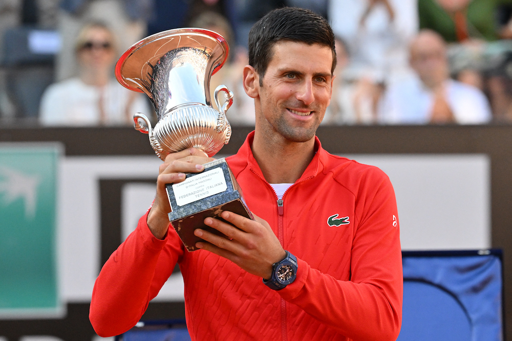 Serbia's Novak Djokovic holds the winner's trophy after winning the final match of the Men's ATP Rome Open tennis tournament against Greece's Stefanos Tsitsipas on May 15, 2022 at Foro Italico in Rome. u00e2u20acu201d AFP pic