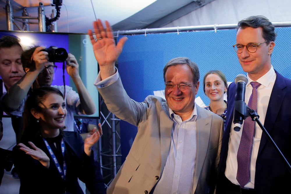 North Rhine Westfalia's Prime Minister, CDU's top candidate Hendrik Wuest and North Rhine Westfalia's former Prime Minister Armin Laschet at the CDU election party  in Duesseldorf May 15, 2022. u00e2u20acu201d Reuters pic