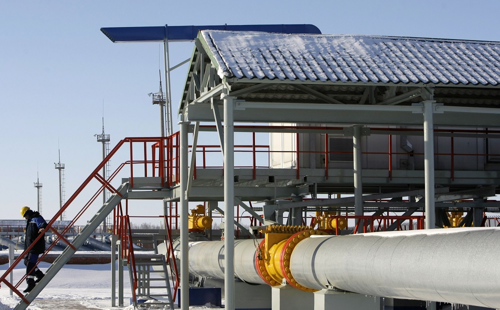 An employee walks at Russian gas export monopoly Gazprom's Sudzha pumping station January 13, 2009. u00e2u20acu201d Reuters pic
