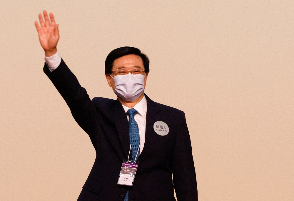 John Lee waves on stage after being elected as Hong Kongu00e2u20acu2122s Chief Executive, in Hong Kong May 8, 2022. u00e2u20acu201d Reuters pic