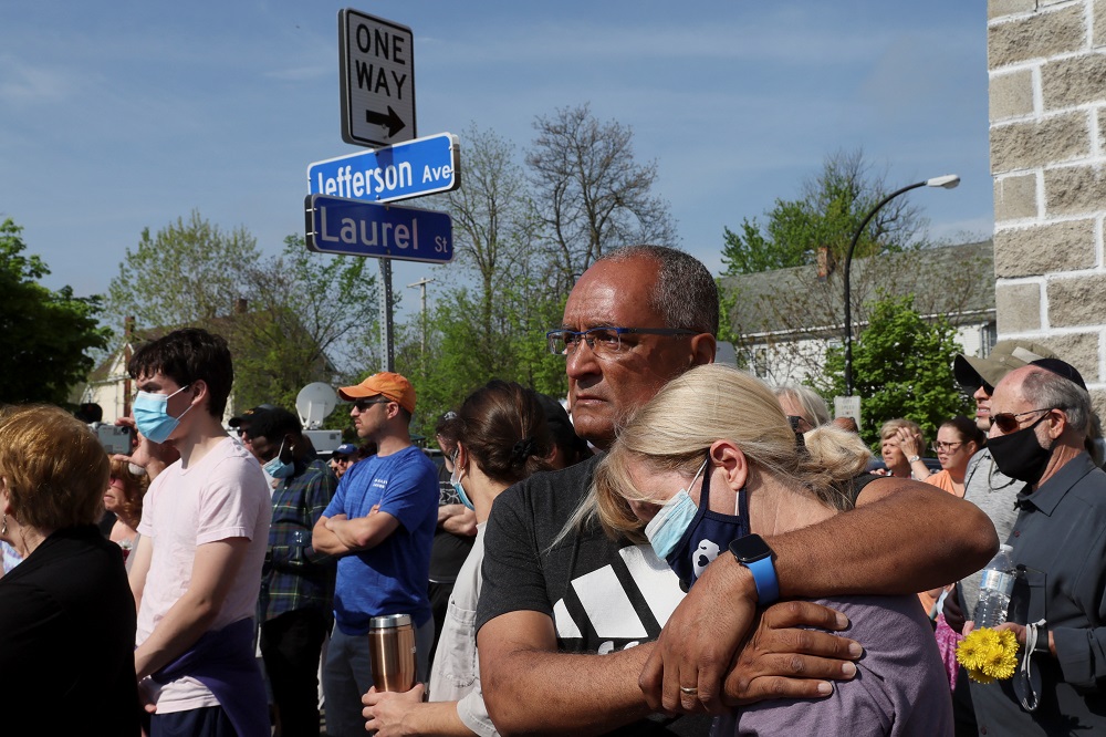 Mourners gather for a vigil for victims of the shooting at a TOPS supermarket in Buffalo, New York May 15, 2022. u00e2u20acu201d Reuters pic