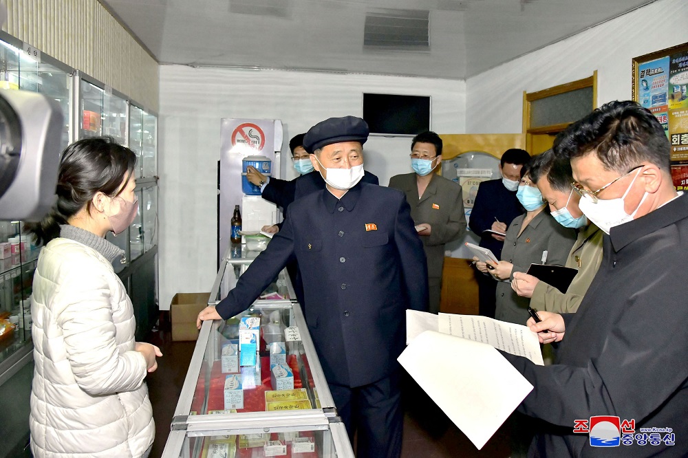 North Korea's Premier Kim Tok Hun, inspects a pharmacy amid the coronavirus disease pandemic in Pyongyang May 17, 2022. u00e2u20acu201d Picture by KCNA via Reuters