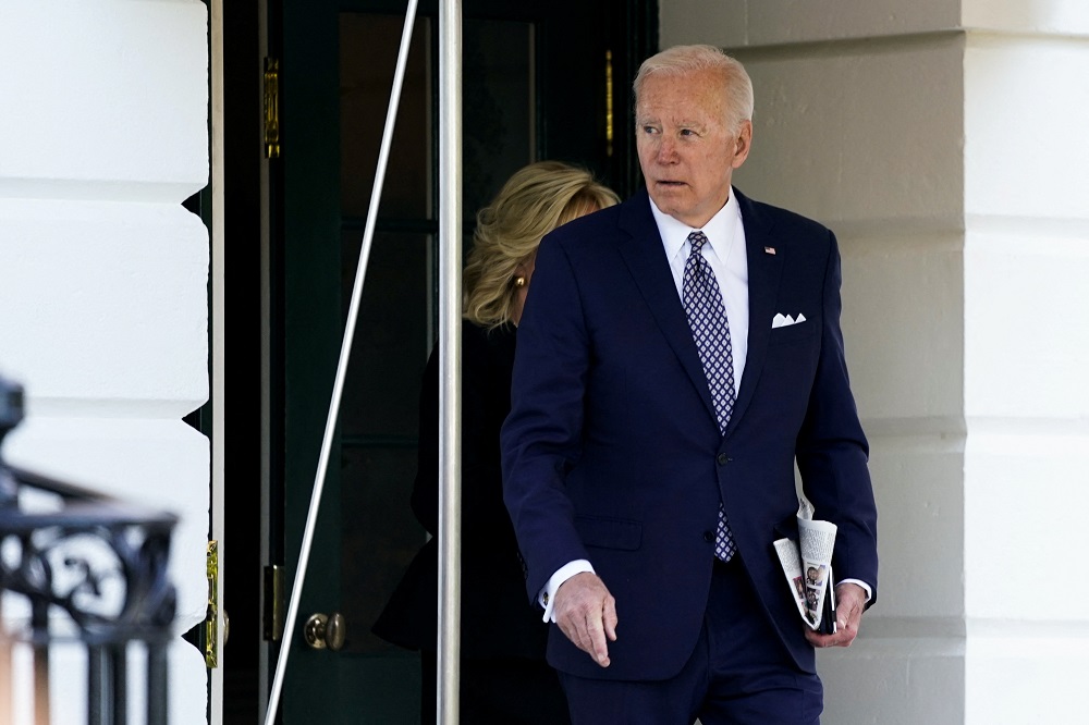 US President Joe Biden and first lady Jill Biden walk towards Marine One as they depart on travel to Buffalo from the White House in Washington May 17, 2022. u00e2u20acu201d Reuters pic