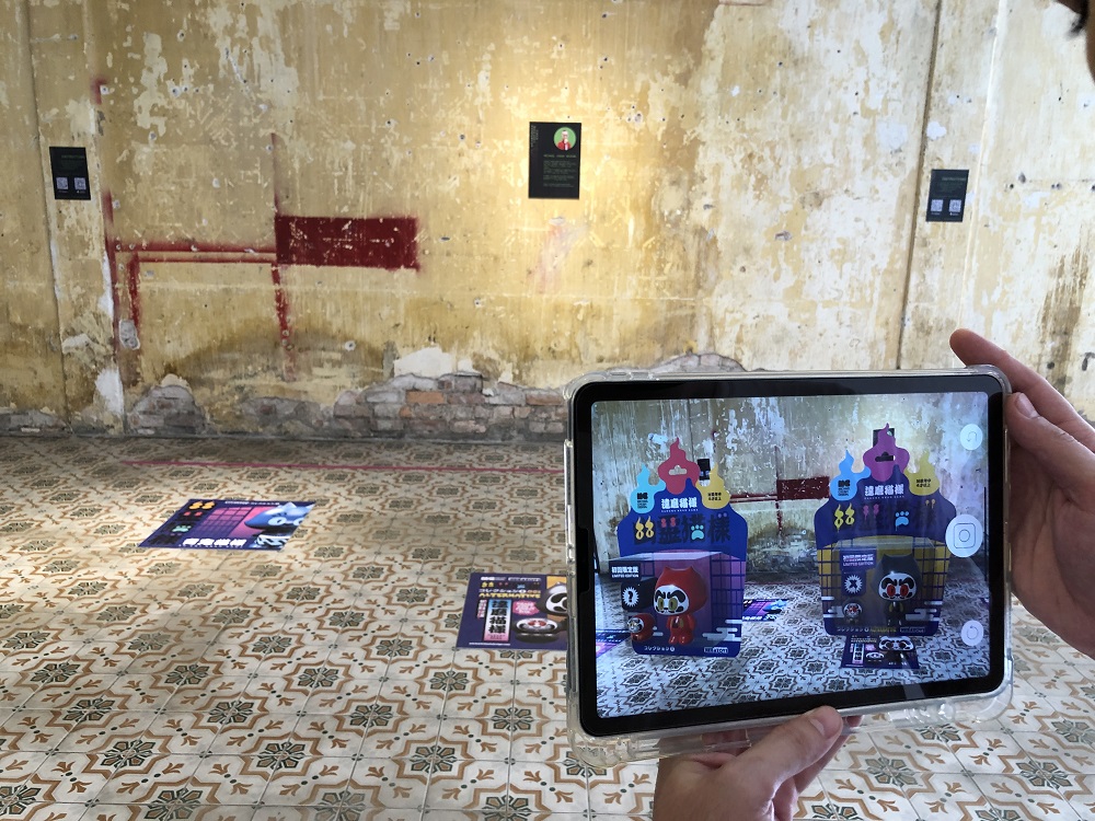 The Yuurei Neko Sama toys by Michael Chuah Design at the Augmented Reality Toy group exhibition that can be viewed using the Perk Reality exhibition.