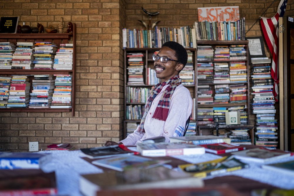 Founder of the Soweto Book Cafe, Thami Mazibuko, looks on in his home in Soweto. u00e2u20acu201d AFP pic