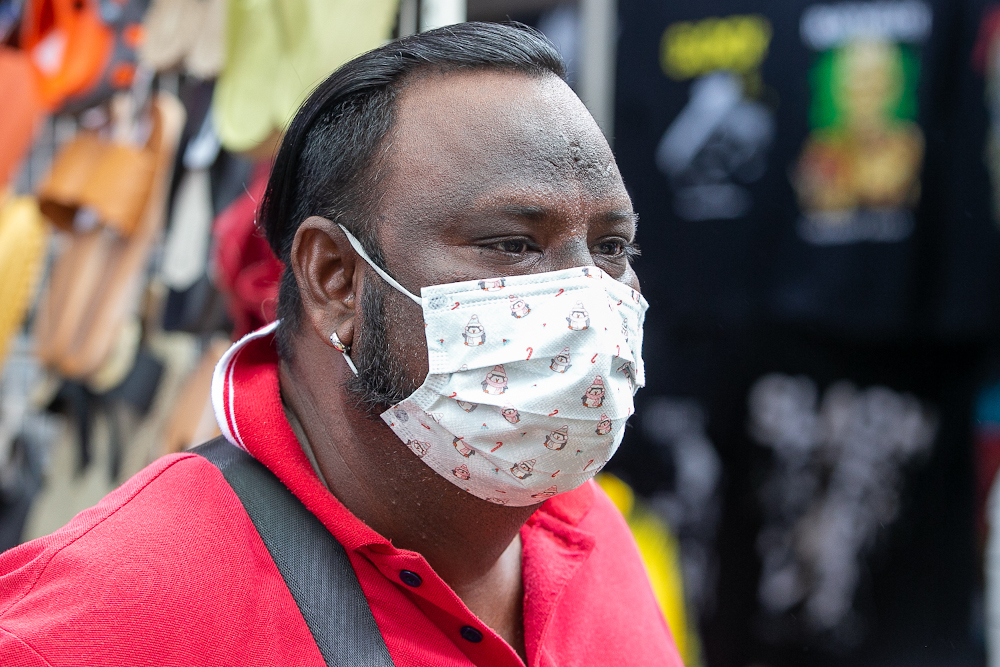 Micheal Raj decided to visit the city centre after not being able to go back to Penang for the holidays. — Picture by Devan Manuel