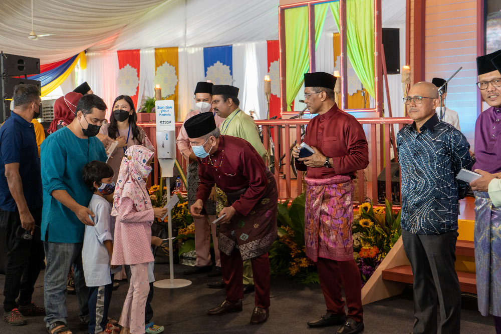 Cabinet ministers sharing a moment with attendees during the Raya Aidilfitri Open House at Seri Perdana, Putrajaya on May 8, 2022. — Picture by Shafwan Zaidon