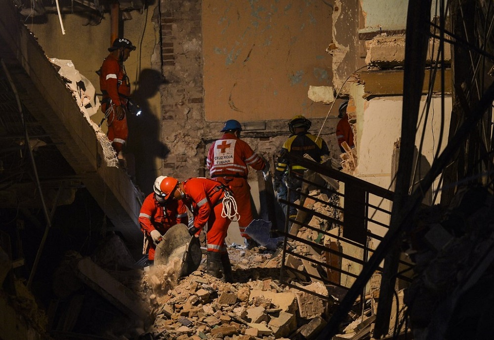 Firefighters and rescue workers remove debris from the ruins of the Saratoga Hotel, in Havana, on May 8, 2022. u00e2u20acu201d AFP pic