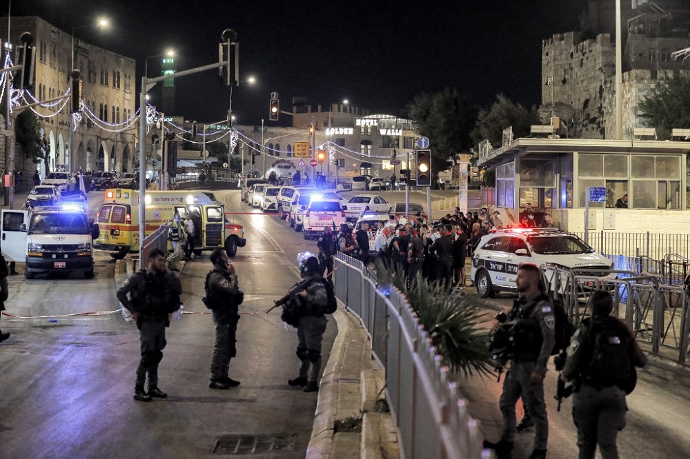 Israeli security forces gather at the scene of a stabbing attack at the Damascus Gate of the Old City of Jerusalem on May 8, 2022. u00e2u20acu201d AFP pic