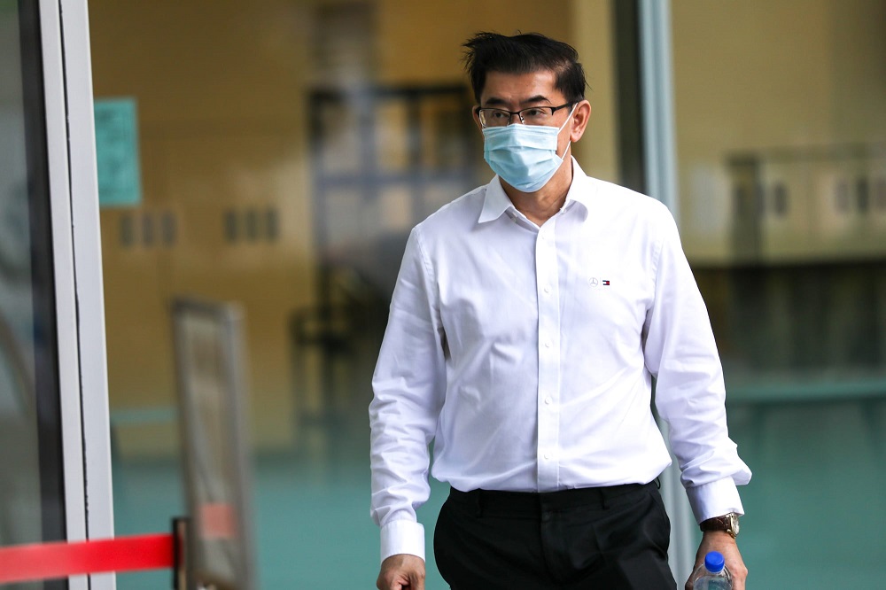 Tan Boon Lee outside the State Courts, May 17, 2022. The Ngee Ann Polytechnic lecturer was charged with making racist remarks, insensitive comments about religion and possession of obscene films. u00e2u20acu201d TODAY pic