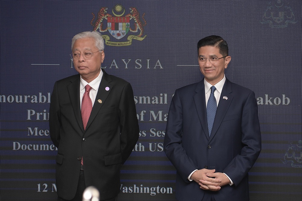 Senior Minister of International Trade and Industry Datuk Seri Mohamed Azmin Ali (right) with Prime Minister Datuk Seri Ismail Sabri Yaakob (left) in Washington May 13, 2022. u00e2u20acu2022 Bernama pic