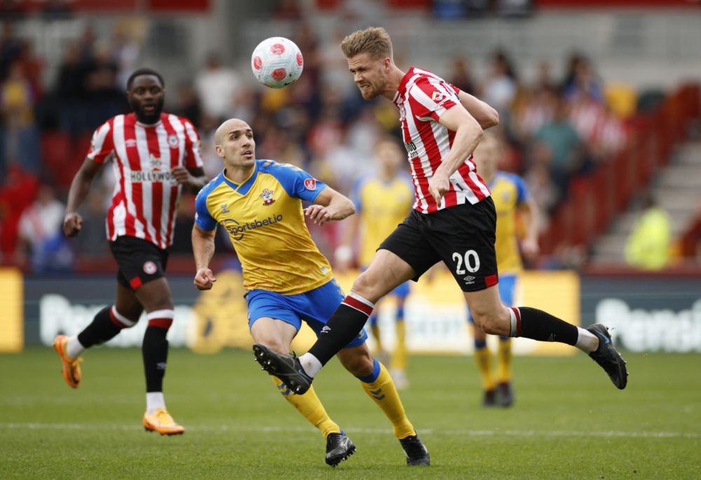 Brentfordu00e2u20acu2122s Kristoffer Ajer in action with Southamptonu00e2u20acu2122s Oriol Romeu during their Premier League match at Brentford Community Stadium, London, May 7, 2022. u00e2u20acu201d Action Images via Reuters
