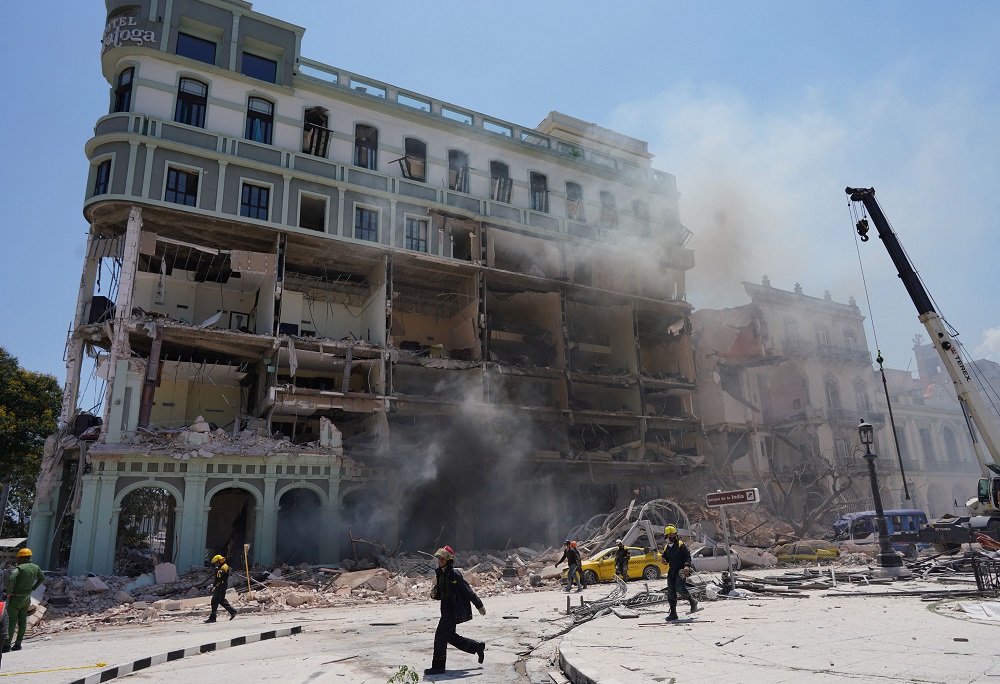 Members of the emergency services walk near the Hotel Saratoga after an explosion in the building, in Havana, Cuba May 6, 2022. u00e2u20acu2022 Reuters pic