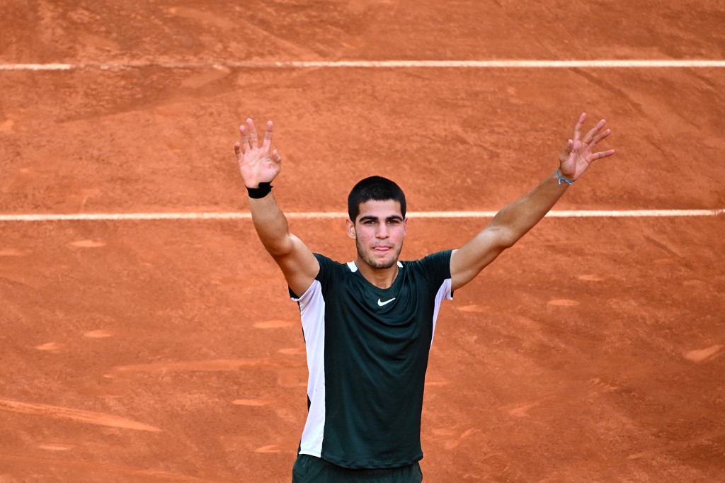 Spainu00e2u20acu2122s Carlos Alcaraz celebrates after winning against Serbiau00e2u20acu2122s Novak Djokovic during their 2022 ATP Tour Madrid Open tennis tournament menu00e2u20acu2122s singles semi-final match at the Caja Magica in Madrid, May 7, 2022. u00e2u20acu201d AFP pic