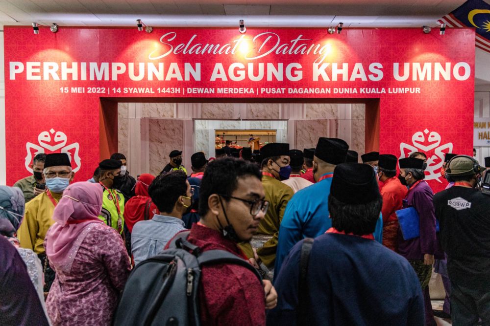Delegates attend the Umno extraordinary general meeting (EGM)at the World Trade Centre in Kuala Lumpur May 15, 2022. u00e2u20acu201d Picture by Firdaus Latif