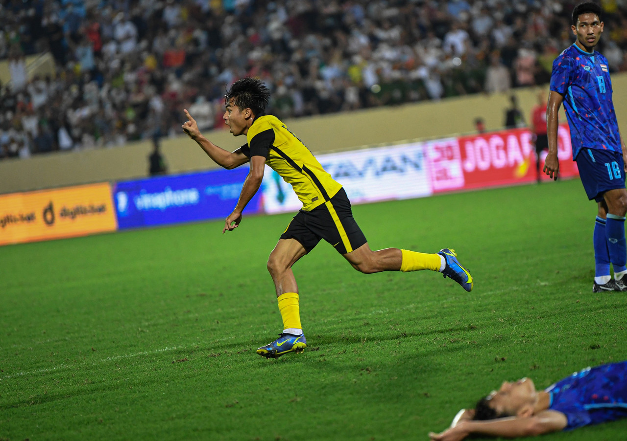 Malaysian player, Nur Azfar Fikri celebrating his goal against the Thai team at the 2021 Sea Games at the Thien Truong Stadium in Nam Dinh, Vietnam, May 7, 2022. u00e2u20acu201d Bernama pic