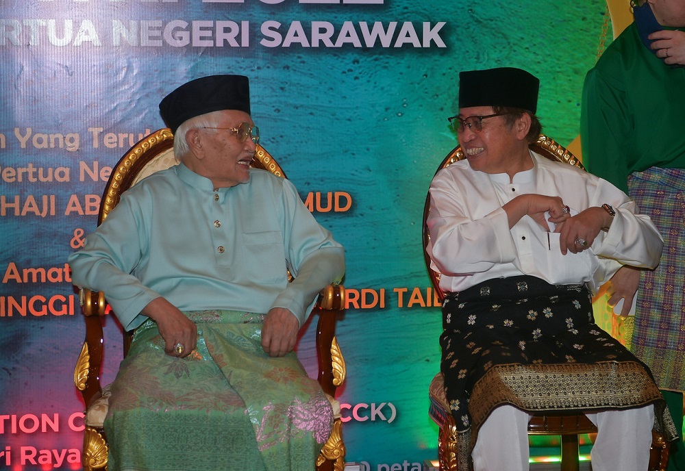 Sarawak Chief Minister Tan Sri Abang Johari Openg (right) attends Sarawak Governor Tun Abdul Taib Mahmudu00e2u20acu2122s (left) Hari Raya open house in Kuching May 2, 2022. u00e2u20acu201d Bernama pic