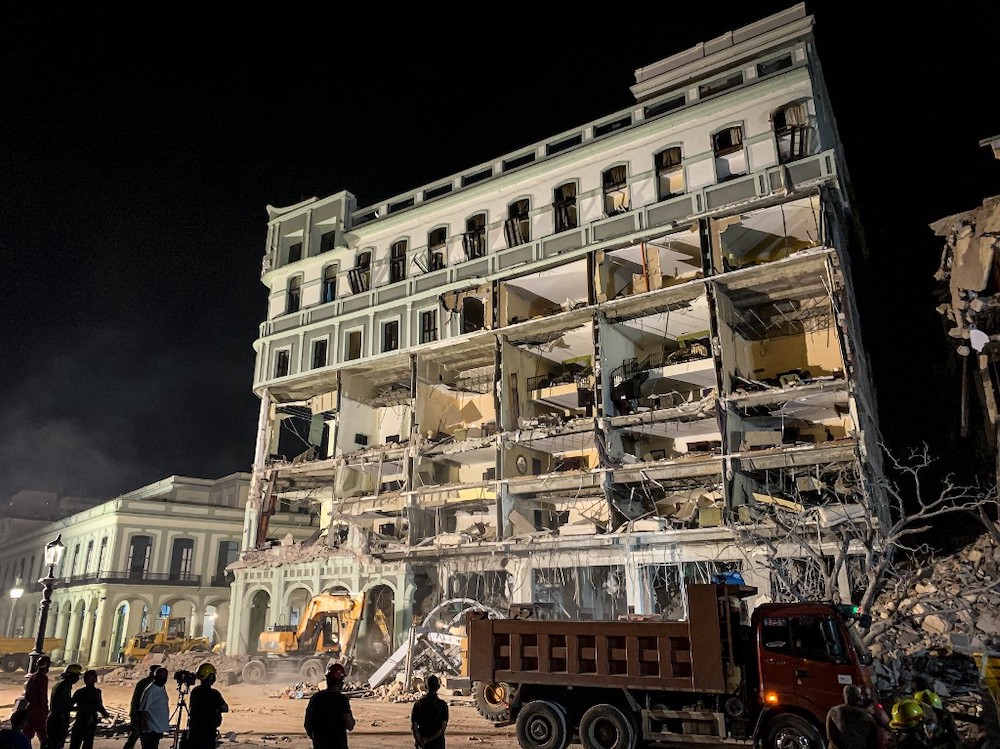 Firefighters remove debris from the ruins of the Saratoga Hotel, in Havana, on May 6, 2022. u00e2u20acu201d AFP picnn
