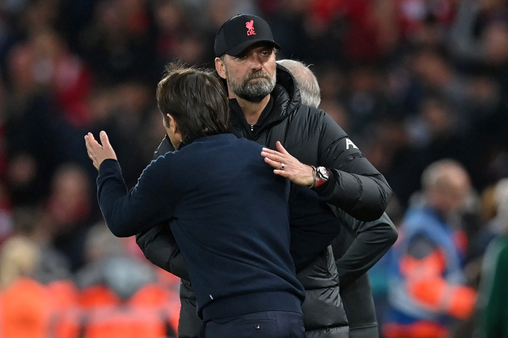 Liverpool manager Jurgen Klopp and Tottenham Hotspur head coach Antonio Conte shake hands after the English Premier League match at Anfield in Liverpool, May 7, 2022. u00e2u20acu201d AFP pic 
