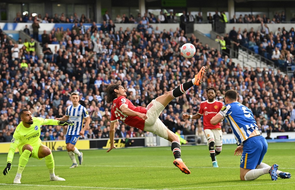 Manchester Unitedu00e2u20acu2122s striker Edinson Cavani (centre) attempts a bicycle kick during the English Premier League match between Brighton and Hove Albion and Manchester United at the American Express Community Stadium in Brighton, May 7, 2022. u00e2u20acu201d AFP pic