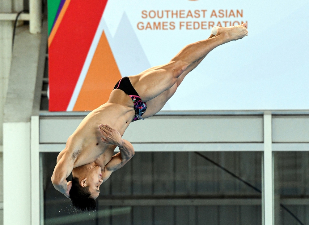 Yesterday, Ooi Tze Liang made history when he bagged his 13th personal gold medal after topping the menu00e2u20acu2122s 1 metre (m) springboard final at the My Dinh Aquatic Centre. u00e2u20acu201d Bernama pic 
