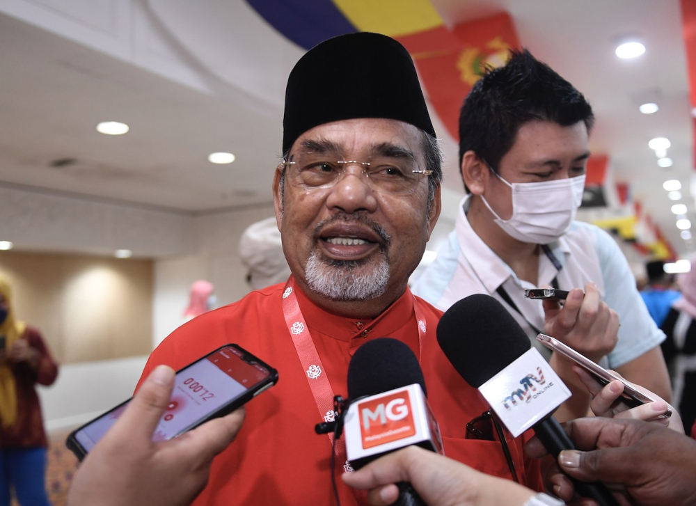Umno supreme council member Datuk Seri Tajuddin Abdul Rahman speaks to reporters at Umnou00e2u20acu2122s extraordinary general meeting (EGM) at the World Trade Centre in Kuala Lumpur May 15, 2022. u00e2u20acu201d Bernama picn