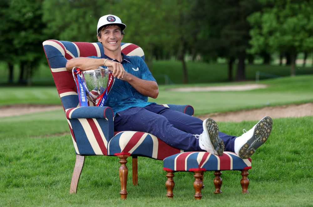 Denmark's Thorbjorn Olesen celebrates with the trophy after winning the British Masters May 8, 2022. u00e2u20acu201d Reuters pic