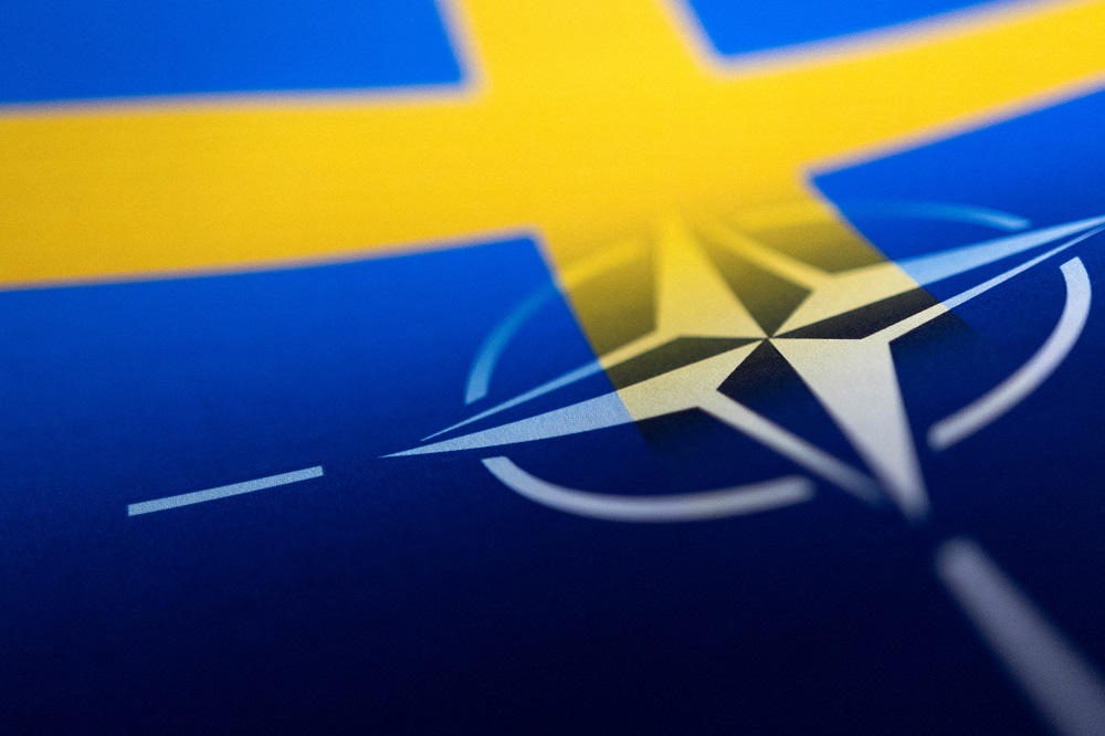 Swedish and Nato flags are seen printed on paper this illustration taken April 13, 2022. u00e2u20acu2022 Reuters pic