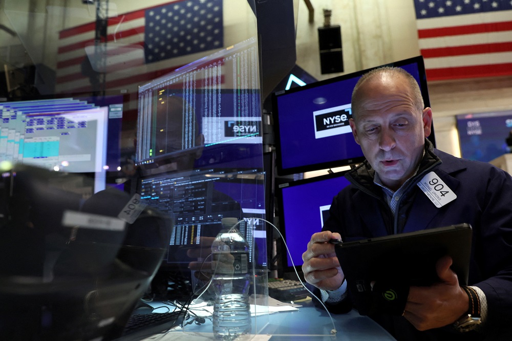A trader works on the floor of the New York Stock Exchange (NYSE) in New York. u00e2u20acu2022 Reuters pic