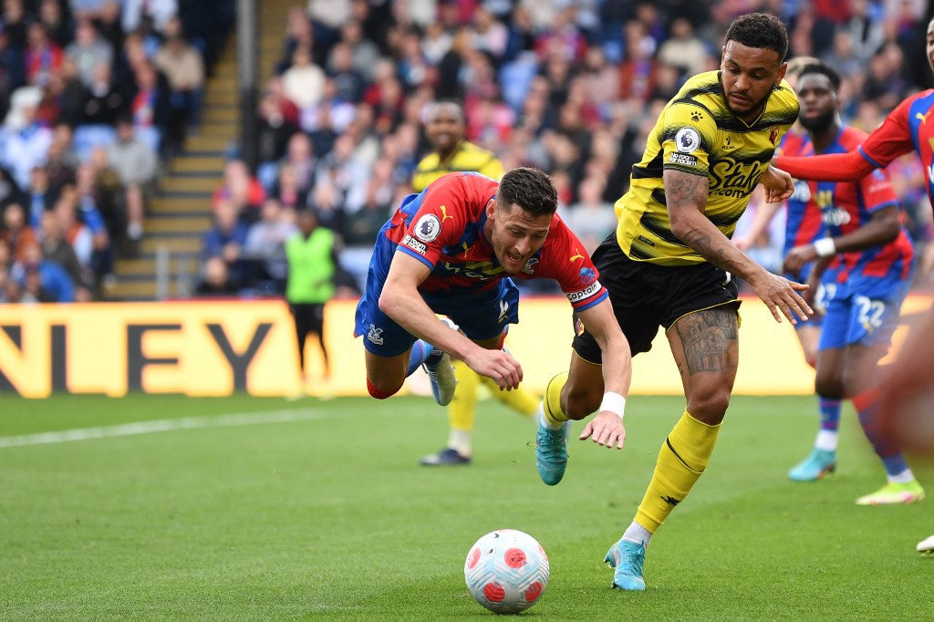 Crystal Palaceu00e2u20acu2122s English defender Joel Ward (left) vies with Watfordu00e2u20acu2122s Norwegian striker Joshua King during their English Premier League match at Selhurst Park in south London, May 7, 2022. u00e2u20acu201d AFP pic
