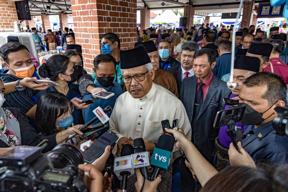 Home Minister Datuk Seri Hamzah Zainudin speaks to reporters at a Hari Raya open house at Pusat Latihan Polis in Kuala Lumpur May 11, 2022. u00e2u20acu201d Picture by Firdaus Latif