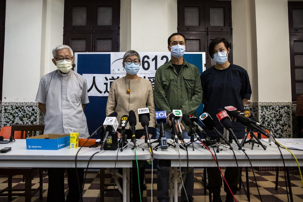 (From left) Cardinal Joseph Zen, barrister Margaret Ng, professor Hui Po-keung and singer Denise Ho announce the closure of the 612 Humanitarian Relief Fund, established to support democracy protesters in Hong Kong August 18, 2021. u00e2u20acu201d AFP pic