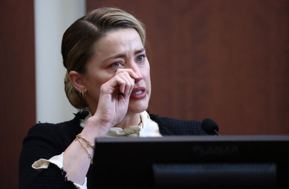 Actor Amber Heard reacts on the stand in the courtroom at Fairfax County Circuit Court during a defamation case against her by ex-husband, actor Johnny Depp in Fairfax May 5, 2022. u00e2u20acu201d Reuters pic