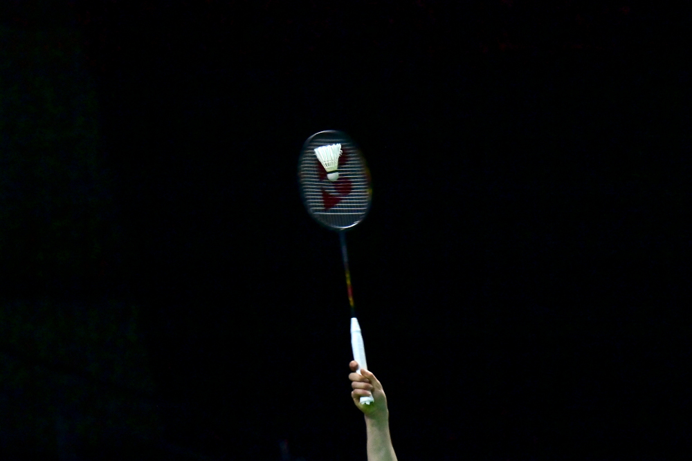 Germanyu00e2u20acu2122s Ann-Katrin Spoeri returns a shot against Japanu00e2u20acu2122s Nozomi Okuhara during the group stages of the Thomas and Uber Cup badminton tournament in Bangkok, May 8, 2022. u00e2u20acu201d AFP pic 
